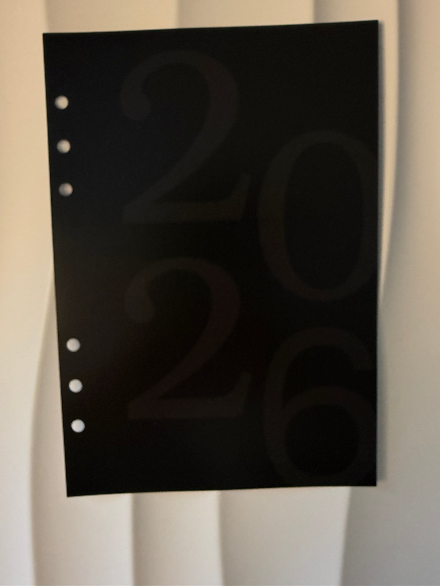 Deckblatt Black 2026